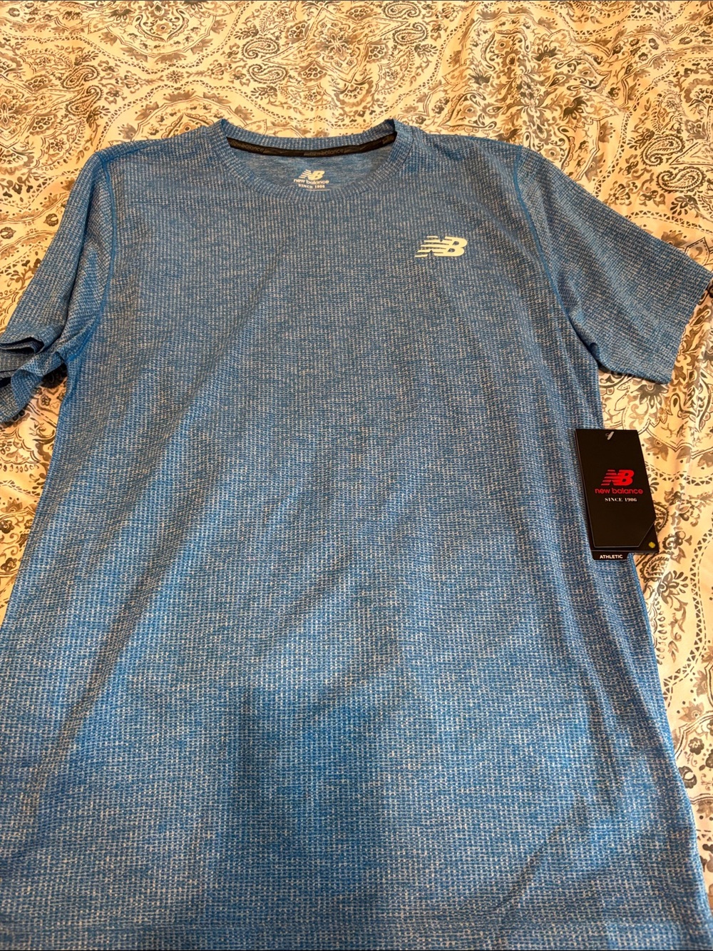 New Balance Men’s Heathered Blue Short-Sleeve Performance Tee
